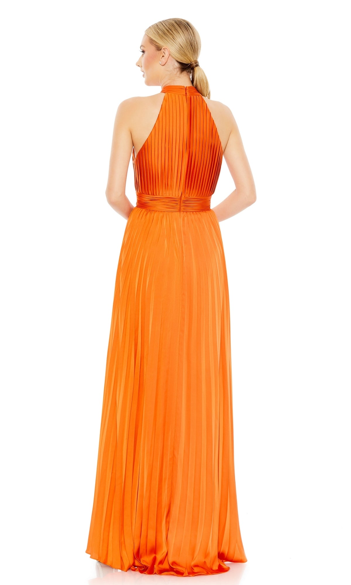 A woman with blonde hair in a low ponytail poses against a white background, wearing the Long Pleated A-Line Formal Dress by Mac Duggal 26992, featuring a high neckline and elegant pleats.